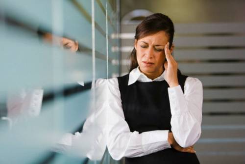 Головная боль у женщины